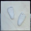 Babyfüsse auf Leinwand